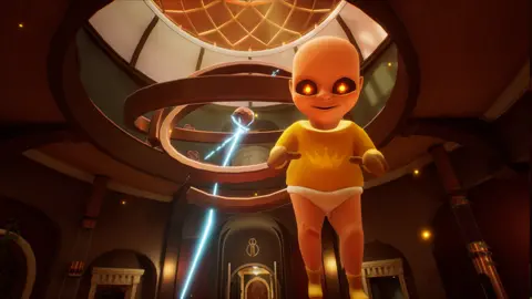 Team Terrible Screenshot shows a sinister, doll-like baby with glowing yellow eyes wearing a yellow baby-gro floating in mid-air. Behind the baby is a large, art deco-style reception hall with a domed glass ceiling, and bolts of electricity shooting from an orb floating in the centre.