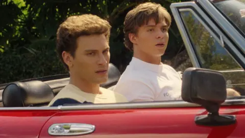 Netflix Cooper Koch (left) and Nicholas Chavez as Erik and Lyle Menendez 