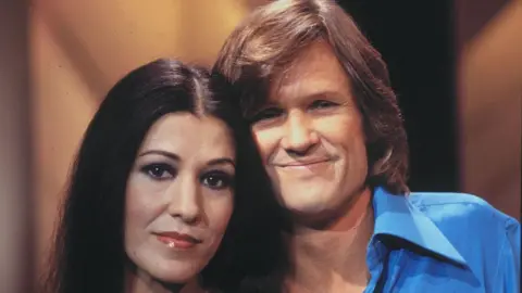 Getty Images Rita Coolidge and Kris Kristofferson pose for a photo in the 1970s