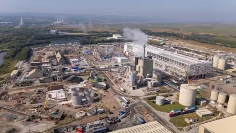 Eren Holding Industrial estate, there is a building on the right and much construction work happening in the left and foreground of the photo