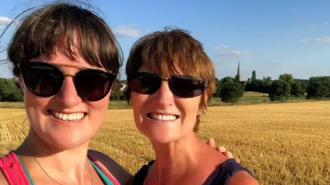 Amy Gray Amy Gray and her mother, Jayne, who died in 2021 from complications related to her cancer