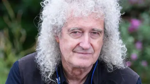 PA Media Sir Brian May