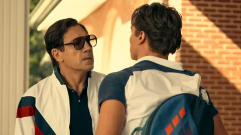 Netflix Javier Bardem as Jose Menendez, Nicholas Chavez as Lyle Menendez in episode one of Monsters: The Lyle And Erik Menendez Story