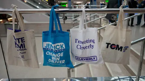 Getty Images Bags displaying the names of the Tory leadership rivals 