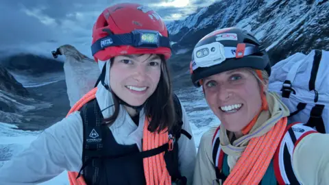 Fay Manners Fay Manners with her climbing partner Michelle Dvorak on a snowy mountain top