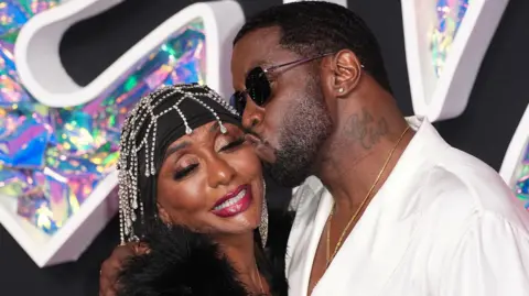 Getty Images Sean Combs kissing his mother Janice on the cheek on the red carpet at the 2023 MTV Awards