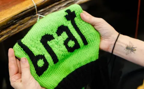 Getty Images Annette Corsino, owner of the Knitting Tree LA , works on a hat named 