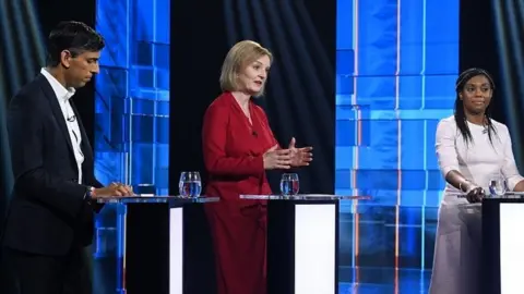 EPA Rishi Sunak, Liz Truss and Kemi Badenoch taking part in a TV debate in July 2022 during the summer Conservative leadership election 