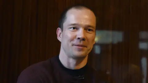 Getty Images A picture taken on March 3, 2017 shows Russian opposition activist Ildar Dadin, 34, who was recently freed after some 15 months spent behind jail for repeated participation in unsanctioned rallies, speaking to press.