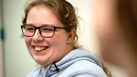 BBC News Lily, 15, is a GCSE student at the school who enjoys drama and football