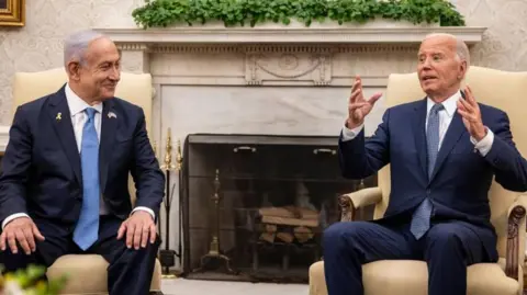 EPA Israeli Prime Minister Benjamin Netanyahu (L) listens to US President Joe Biden during a bilateral meeting in the Oval Office at the White House, in Washington, DC, USA, 25 July 2024