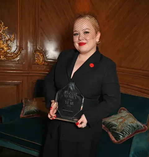 Getty Images Nicola Coughlan holding an award 