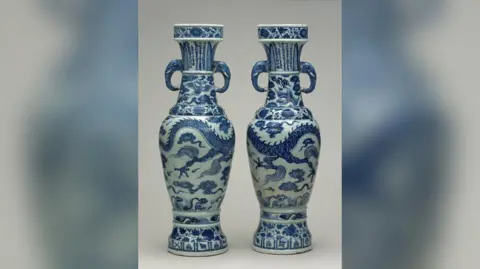 PA Media Two David Vases - blue and white