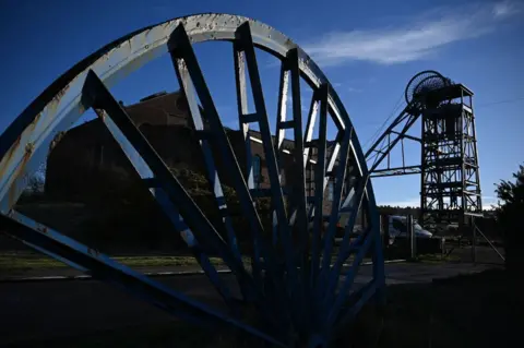 Getty Images Pit head winding gear at the Haig Colliery Mining Museum, pictured close to the former Woodhouse Colliery in Whitehaven.