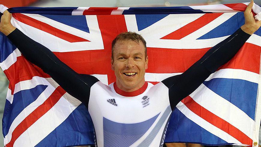 Sir Chris Hoy celebrates with the Union Jack after winning the final of the men's keirin track cycling at the London 2012 Olympic Games