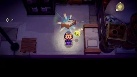 Nintendo Screenshot shows a princess character in a dark, underground room. She's looking up at the viewer, her arms held wide in celebration, as a glowing bed icon floats above her head.