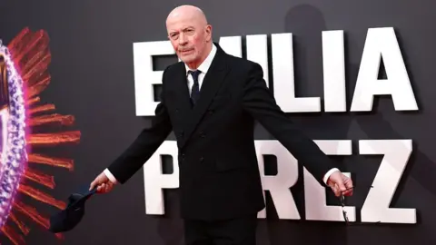 Getty Images French film director Jacques Audiard poses on the red carpet upon arrival to attend the Gala screening of 