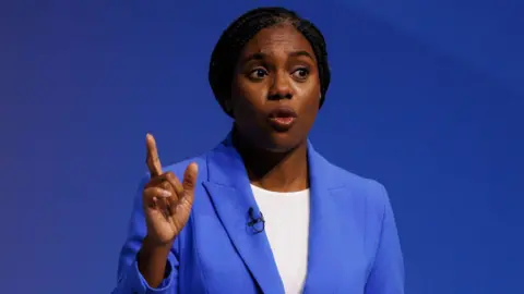 Getty Images Kemi Badenoch delivers her speech on the final day of the Conservative Party conference in Birmingham