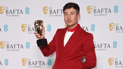 Getty Images Keoghan with his Bafta for best supporting actor in The Banshees of Inisherin