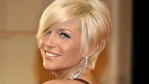 Yui Mok/PA Wire A picture of late Girls Aloud singer Sarah Harding