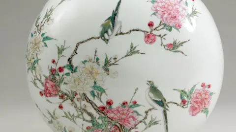 PA Media Paintings of birds and flowers on a ceramic object