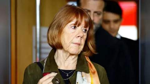 Reuters Frenchwoman Gisèle Pelicot, the victim of an alleged mass rape orchestrated by her husband Dominique Pelicot at their home in the southern French town of Mazan, leaves during a break in the trial of Dominique Pelicot with 50 co-accused, at the courthouse in Avignon, France, November 19, 2024