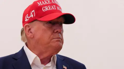 Reuters Donald Trump speaks to reporters after voting at Mandel Recreation Center on Election Day in Palm Beach, Florida, 5 November 2024