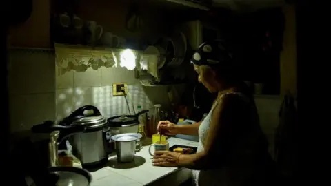 Reuters Havana resident Araselys Rodriguez seen making coffee during a blackout