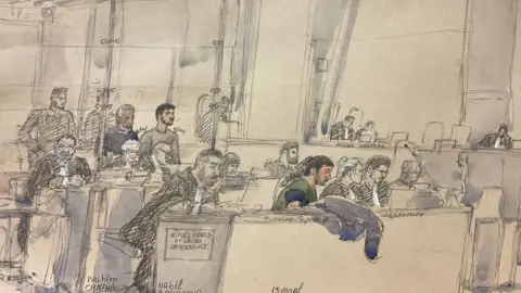 BENOIT PEYRUCQ/AFP A court sketch shows (L-R) defendants Brahim Chnina, Nabil Boudaoud and Ismael Gamaev at their trial in Paris