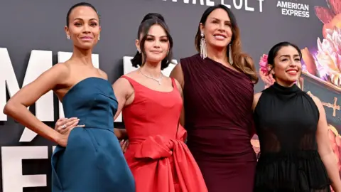 Getty Images Zoe Saldaña, Selena Gomez, Karla Sofía Gascón and Adriana Paz attend the 