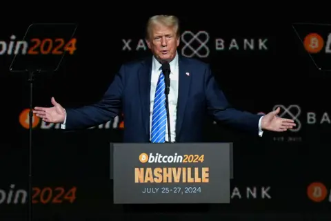 Reuters Republican presidential nominee and former U.S. President Donald Trump gestures at the Bitcoin 2024 event in Nashville, Tennessee, U.S., July 27, 2024.