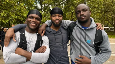 Danai Nesta Kupemba / BBC An image of the co-founders of the Ozo run club - Chibueze Odoemene (l),  Emeka Atumonyogo (r) and Chigo Ogbonna (m)