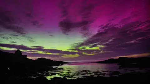 PA Media Aurora borealis in Howick, Northumberland 