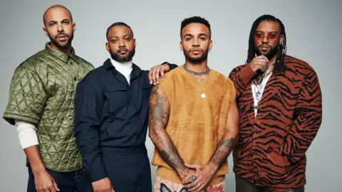 PA Media Marvin Humes, Aston Merrygold, JB Gill and Oritse Williams in a promotional picture for their most recent tour