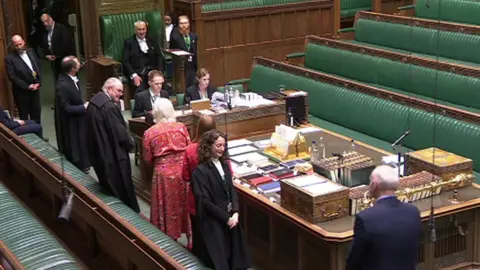 BBC MPs line up on the floor of the House of Commons to be sworn in by the despatch box after the 2024 General Election