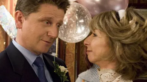 ITV Gail's wedding to Joe McIntyre, the couple are pictured with balloons