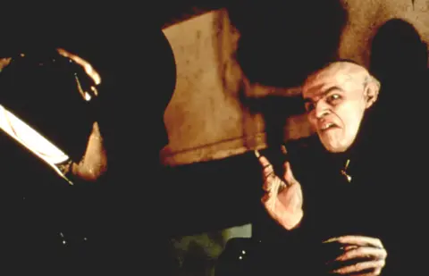 Shutterstock Willem Dafoe playing Max Schreck and Count Orlok in Shadow of the Vampire in 2000