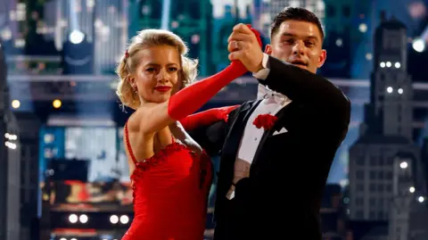 BBC/PA BBC handout photo of Tasha Ghouri and Aljaz Skorjanec, during the dress rehearsal for Saturday's Strictly Come Dancing show on BBC1. Picture date: Saturday December 14, 2024. PA