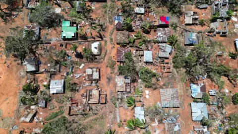 Reuters A drone view of destroyed houses and buildings following cyclone Chido in Pemba, Mozambique, December 18, 2024