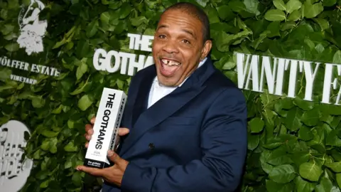 Getty Images Clarence Maclin poses with the Outstanding Supporting Performance award for 