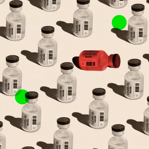 Getty Images A treated image of Covid vaccination vials, with one tipped over and coloured red