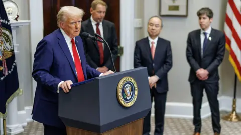 Getty Images US President Donald Trump, Larry Ellison, co-founder and executive chairman of Oracle Corp., Masayoshi Son, chief executive officer of SoftBank Group Corp., and Sam Altman, chief executive officer of OpenAI Inc., in the Roosevelt Room of the White House in Washington, DC, US.