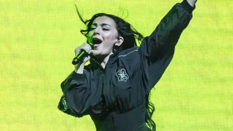 Getty Images Charli XCX performing on stage