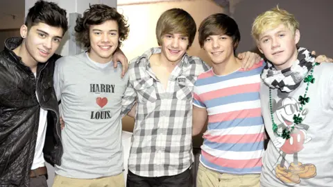 Getty Images (L-R) Zayn Malik, Harry Styles, Liam Payne, Louis Tomlinson and Niall Horan of one Direction pictured in 2011 at an HMV store