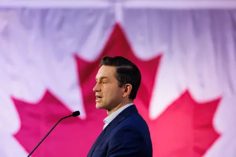 Getty Images Pierre Poilievre, leader of Canada's Conservative Party, speaks during a news conference in Toronto, Ontario, Canada, on Tuesday, Dec. 17, 2024.