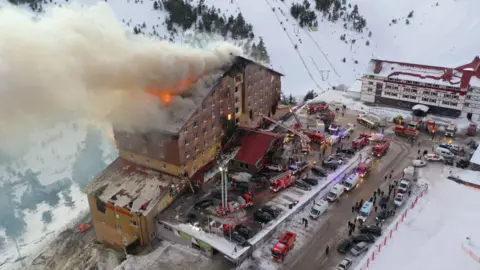 Getty Images An aerial view of the area as fire brigades responding to a fire that broke out in a hotel in Bolu Kartalkaya Ski Center, on January 21, 2025 in Bolu, Turkey.