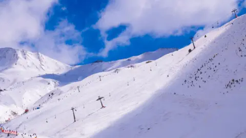 Getty Images Ski slopes and mountainside covered in snow at the Astún Ski Resort, in the Pirineos Mountains, Huesca, Spain.