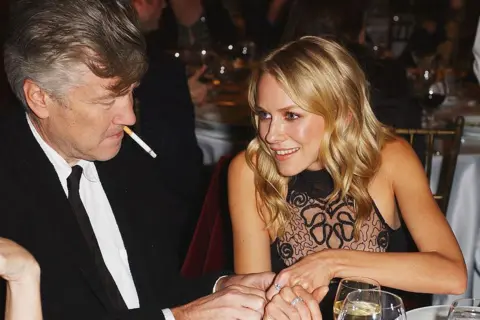 Getty Images David Lynch speaking with Naomi Watts before she accepted Movieline's breakthrough performance award in 2001