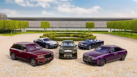 Rolls-Royce Motor Cars A Rolls-Royce Phantom, Ghost, Cullinan and Spectre displayed on Festival’s Laundry Green, next to Goodwood House