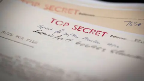 PA Media Top Secret markings on some of the files MI5 has made available to the National Archives in Kew, west London.